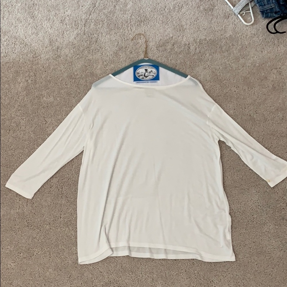 white flowy shirt with tight sleeves